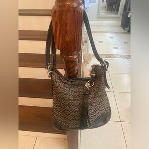 Vintage coach purse. Was loved and needing a new home.